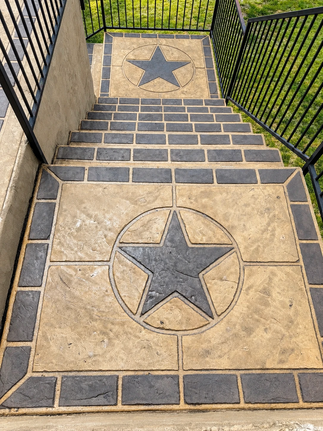 Decorative concrete stairs and landings with Texas star medallions